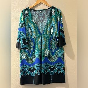 Large paisley blue, green and black low front V neck blouse.